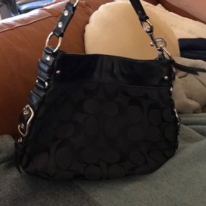 Authentic Black Coach with gold hardware